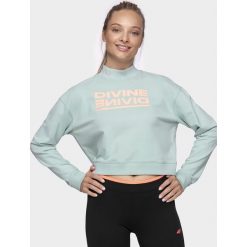 Bluza damska BLD212 - mięta. Bluzy damskie s, bez wzorów, z dzianiny, z krótkim rękawem, krótkie, bez kaptura. W wyprzedaży za 59,99 zł.