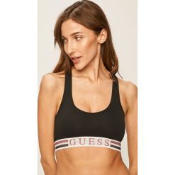 Guess Jeans - Biustonosz sportowy. Szare biustonosze sportowe damskie Guess Jeans, s, z nadrukiem, z elastanu. W wyprzedaży za 99,90 zł.