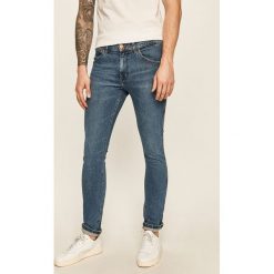 Wrangler - Jeansy Bryson. Niebieskie jeansy męskie Wrangler, z aplikacjami. W wyprzedaży za 229,90 zł.