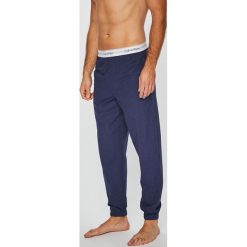 Calvin Klein Underwear - Spodnie piżamowe. Niebieskie piżamy męskie marki Calvin Klein Underwear, s, z elastanu. W wyprzedaży za 159,90 zł.