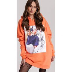 Pomarańczowa Bluza Thessamara. Pomarańczowe bluzy damskie Renee, xl, bez wzorów, bez rękawów, z kapturem. Za 99,99 zł.