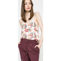 Tommy Hilfiger - Top. Białe topy damskie marki TOMMY HILFIGER, xl, z wiskozy, casualowe, bez rękawów. W wyprzedaży za 59,90 zł.