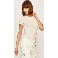 Marc O'Polo - T-shirt. Czarne bluzki damskie Marc O'Polo, s, bez wzorów, z bawełny, z okrągłym kołnierzem. W wyprzedaży za 119,90 zł.