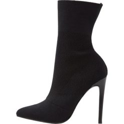Steve Madden CENTURY Botki na obcasie black. Czerwone botki damskie na obcasie marki Steve Madden, z materiału. Za 459,00 zł.