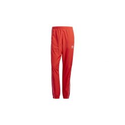 Spodnie treningowe adidas Spodnie dresowe Authentics. Czerwone spodnie dresowe męskie marki Adidas, z dresówki. Za 329,00 zł.