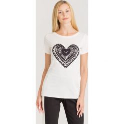 T-SHIRT U&B TWINSET. Białe t-shirty damskie Twinset U&B, s, z aplikacjami, z bawełny, z okrągłym kołnierzem. Za 379,00 zł.