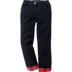 Spodnie dziewczęce z ciepłą flanelową podszewką bonprix czarny. Czarne spodnie dziewczęce bonprix, bez wzorów, z elastanu. Za 99,99 zł.