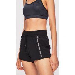 Reebok - Szorty. Czarne spodenki sportowe damskie Reebok, s, bez wzorów, z poliesteru, sportowe. W wyprzedaży za 89,90 zł.