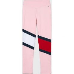 Tommy Hilfiger - Legginsy dziecięce 128-176 cm. Różowe spodnie dziewczęce TOMMY HILFIGER, m, bez wzorów, z elastanu. W wyprzedaży za 159,90 zł.