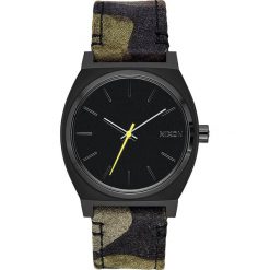 Zegarek kwarcowy "Time Teller" w kolorze oliwkowo-antracytowym. Brązowe, analogowe zegarki męskie Nixon, ze stali. W wyprzedaży za 129,95 zł.