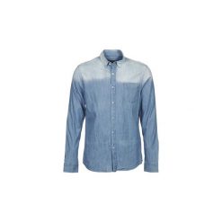 Koszule z długim rękawem Calvin Klein Jeans WHAM. Niebieskie koszule męskie Calvin Klein Jeans, s, bez wzorów, z jeansu, bez kołnierzyka, z długim rękawem. W wyprzedaży za 351,20 zł.