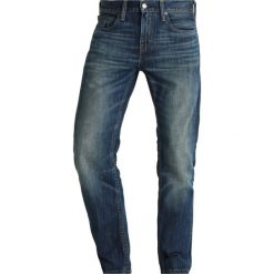 Levi's® 527 SLIM BOOT CUT Jeansy Bootcut bedside blues. Niebieskie jeansy męskie slim marki Levi's®, z bawełny. W wyprzedaży za 319,20 zł.