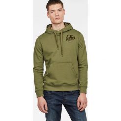 Bluza w kolorze zielonym. Zielone bluzy męskie G-Star, s, z nadrukiem, z bawełny, z kapturem, bez rękawów, bez kaptura. W wyprzedaży za 307,95 zł.