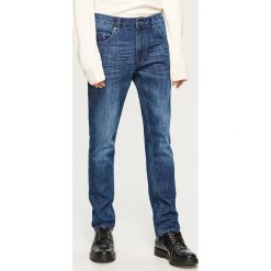 Jeansy slim fit Thermolite® - Granatowy. Niebieskie jeansy męskie relaxed fit marki KIPSTA, z materiału, młodzieżowe. Za 169,99 zł.
