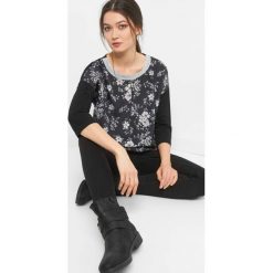 Bombkowa koszulka w kwiaty. Czarne t-shirty damskie Orsay, xs, w kwiaty, z poliesteru. W wyprzedaży za 40,00 zł.
