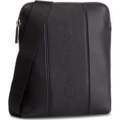 Saszetka CALVIN KLEIN - Strike Flat Crossover K50K504275 001. Czarne torby męskie skórzane Calvin Klein, bez wzorów, ze skóry ekologicznej, młodzieżowe. W wyprzedaży za 259,00 zł.