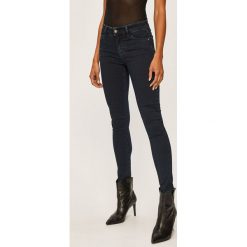 Diesel - Jeansy Slandy. Niebieskie jeansy damskie Diesel, bez wzorów, z elastanu. Za 619,90 zł.