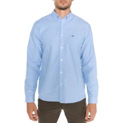 Lacoste Koszula Niebieski. Niebieskie koszule męskie Lacoste, m, bez wzorów, z bawełny, bez kołnierzyka, z długim rękawem. Za 404,95 zł.