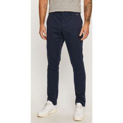 Marciano Guess - Spodnie. Niebieskie spodnie męskie MARCIANO GUESS, na co dzień, m, z aplikacjami, z bawełny. W wyprzedaży za 299,90 zł.