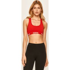 Guess Jeans - Biustonosz. Czarne biustonosze sportowe damskie Guess Jeans, s, z nadrukiem, z bawełny. W wyprzedaży za 89,90 zł.