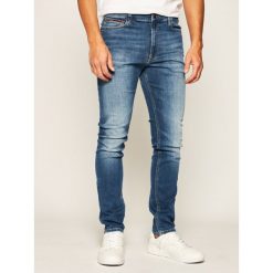 Jeansy Skinny Fit Tommy Jeans Simon DM0DM07981. Niebieskie jeansy męskie Tommy Jeans, m, bez wzorów. Za 429,00 zł.