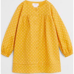 Mango Kids - Sukienka dziecięca Bali 80-104 cm. Żółte sukienki dziewczęce Mango Kids, bez wzorów, z bawełny, z długim rękawem, długie, maxi, rozkloszowane. W wyprzedaży za 71,90 zł.