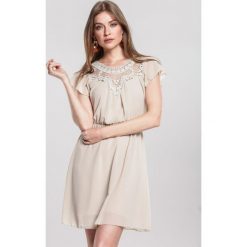 Jasnobeżowa Sukienka Mart. Brązowe sukienki damskie other, na imprezę, s, z haftami, eleganckie, bez kołnierzyka, bez rękawów, mini. Za 79,99 zł.