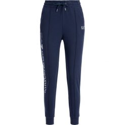 Spodnie dresowe EA7 Emporio Armani 6GTP64 TJ31Z 1554. Niebieskie spodnie damskie EA7 Emporio Armani, m, z elastanu. W wyprzedaży za 309,00 zł.