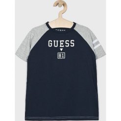 Guess Jeans - T-shirt dziecięcy 118-175 cm. Niebieskie t-shirty chłopięce Guess Jeans, z nadrukiem, z bawełny, bez rękawów. W wyprzedaży za 79,90 zł.