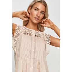 Levi's - Bluzka. Różowe bluzki damskie Levi's®, s, bez wzorów, z bawełny, casualowe, z okrągłym kołnierzem, bez rękawów. Za 239,90 zł.