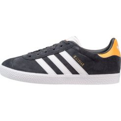 Adidas Originals GAZELLE Tenisówki i Trampki carbon/footwear white/real gold. Szare trampki dziewczęce adidas Originals, ze skóry ekologicznej. Za 269,00 zł.