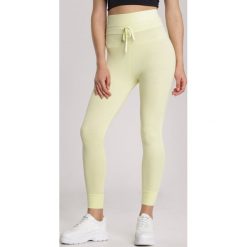 Żółte Legginsy Perinope. Żółte legginsy damskie Renee, s, bez wzorów. Za 59,99 zł.