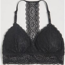 Koronkowy biustonosz longline - Czarny. Czarne biustonosze Sinsay, bez wzorów, z koronki. Za 24,99 zł.