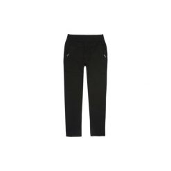 Spodnie damskie legginsy z kieszeniami gładkie. Czarne legginsy TXM. Za 34,99 zł.