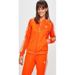 Adidas Originals - Bluza. Pomarańczowe bluzy damskie adidas Originals, bez wzorów, z elastanu, bez rękawów, bez kaptura. Za 249,90 zł.