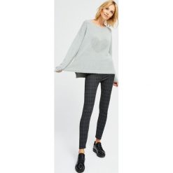 Spodnie typu legins w kratkę. Spodnie damskie Moodo, s. Za 29,99 zł.