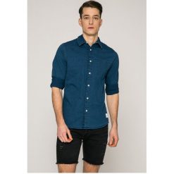 Calvin Klein Jeans - Koszula. Szare koszule męskie jeansowe Calvin Klein Jeans, m, z klasycznym kołnierzykiem, z długim rękawem. W wyprzedaży za 279,90 zł.