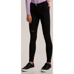 Czarne Spodnie Skinny Urillyss. Czarne spodnie damskie Renee, bez wzorów. Za 119,99 zł.