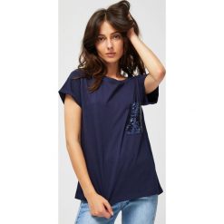 Bluzka z cekinami. Bluzki damskie Moodo, xs. Za 19,99 zł.