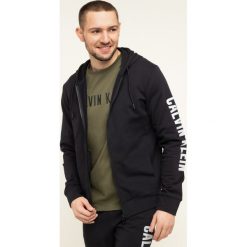 Bluza Calvin Klein Performance 00GMH9J473. Czarne bluzy męskie Calvin Klein Performance, m, bez wzorów, z bawełny, bez kołnierzyka, bez rękawów, bez kaptura. Za 399,00 zł.