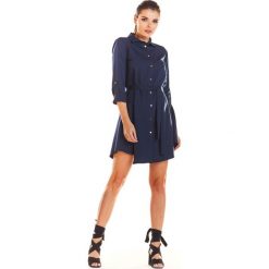 Sukienka koszulowa do kolan granatowa - xl. Sukienki damskie e-margeritka.pl, na co dzień, xl, w paski, z poliesteru, eleganckie, z koszulowym kołnierzykiem, z długim rękawem, długie, midi, proste. Za 144,99 zł.