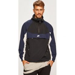 Nike Sportswear - Kurtka. Czarne płaszcze męskie Nike Sportswear, xl, bez wzorów, z poliesteru, krótkie, z kapturem. W wyprzedaży za 319,90 zł.
