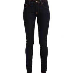 Nudie Jeans SKINNY LIN Jeans Skinny Fit dry deep orange. Pomarańczowe rurki damskie marki Nudie Jeans, z elastanu. Za 459,00 zł.
