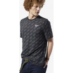 Reebok Koszulka Czarny. Czarne t-shirty męskie Reebok, m, bez wzorów, z bawełny, bez kołnierzyka, krótkie. Za 145,95 zł.