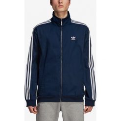 Adidas Originals Bluza Niebieski. Niebieskie bluzy męskie adidas Originals, s, bez wzorów, z bawełny, bez kołnierzyka, bez rękawów, bez kaptura. Za 369,95 zł.