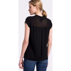 Nike Sportswear - Top. Żółte topy damskie marki Nike Sportswear, s, z wiskozy, z okrągłym kołnierzem. W wyprzedaży za 139,90 zł.