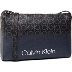 Torebka CALVIN KLEIN - Ck Mono Ombre Ew Crossbody K60K606640 OGY. Niebieskie listonoszki damskie Calvin Klein, bez wzorów, ze skóry ekologicznej, bez dodatków. Za 399,00 zł.