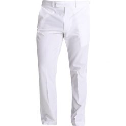 Chinosy męskie: Polo Ralph Lauren Golf TAILOREDFIT Spodnie materiałowe white