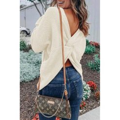 Sweter damski TALIKA ECRU. Bluzy damskie Sweter damski TALIKA ECRU, uniwersalny, bez wzorów, bez rękawów, bez kaptura. W wyprzedaży za 59,00 zł.