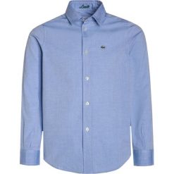 Lacoste Koszula light blue. Niebieskie koszule chłopięce Lacoste, z bawełny. Za 279,00 zł.